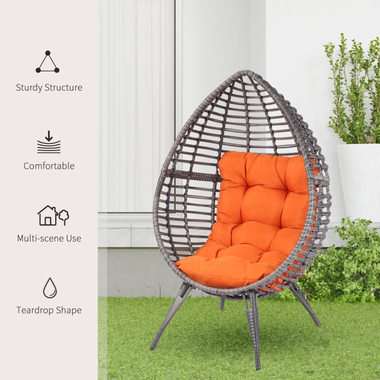 Outdoor-ready egg chair with orange cushion and dark PE wicker teardrop frame