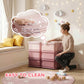 Pink 3-tier storage organizer being wiped clean with a damp cloth