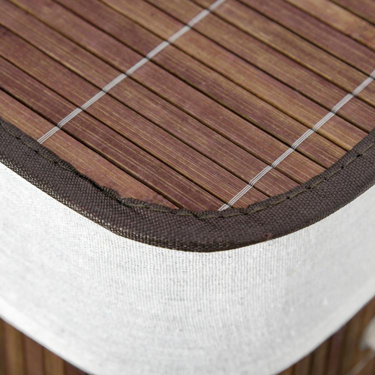 Collapsible laundry hamper rim with dark brown woven edge and white fabric liner