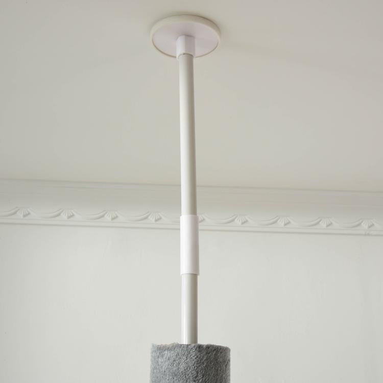 Adjustable cat tree top with white ceiling-mounted pole and grey scratching base