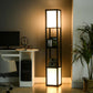 Black tall shelf floor lamp with bright square panel lights and vertical storage shelves