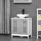 White bathroom vanity with grey slatted doors and countertop sink
