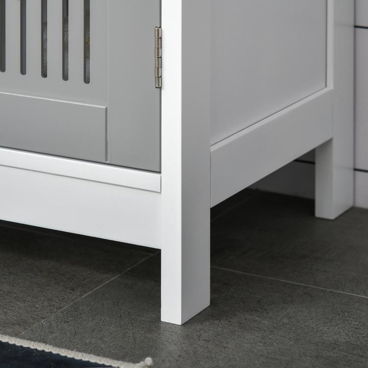 White pedestal cabinet corner with raised feet and open base space