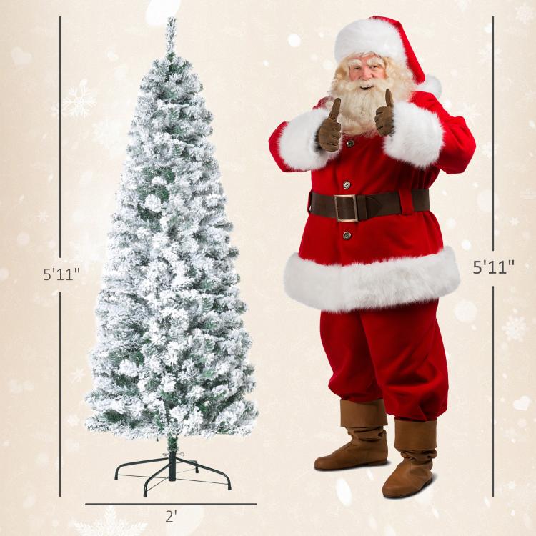 Artificial snow-flocked Christmas tree next to Santa figure for size comparison