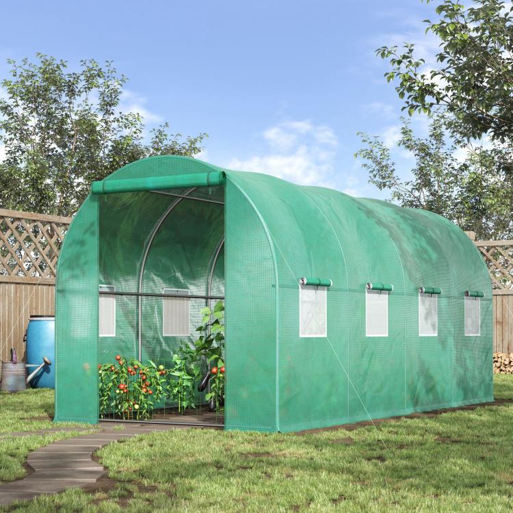 Green tunnel hoop greenhouse with curved frame and open front section with mesh windows