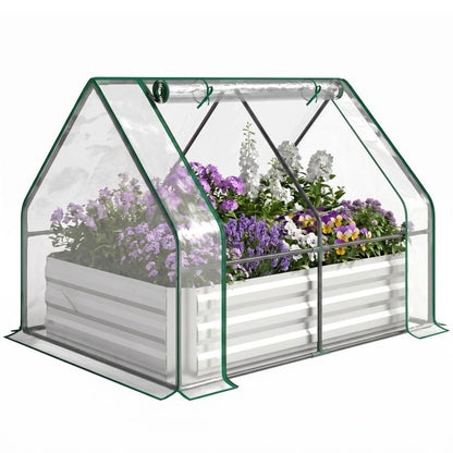 Clear-covered raised garden planter box with green metal frame and galvanized side panels