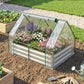 Raised garden bed planter with clear cover and green metal frame, protective greenhouse style