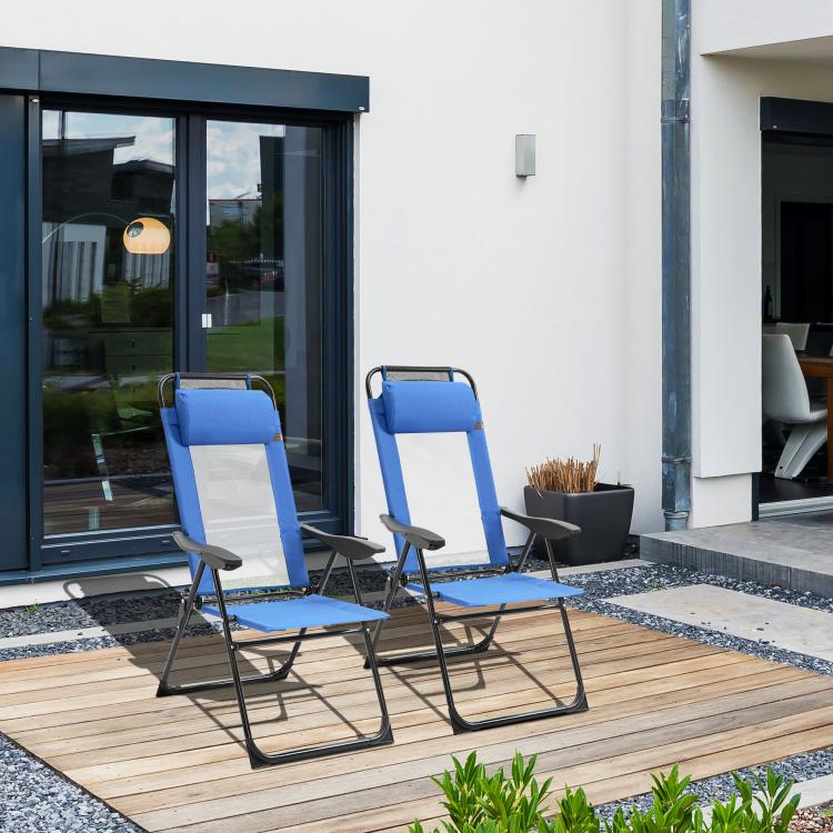 Blue folding patio dining chairs with black frame and armrest rests on deck