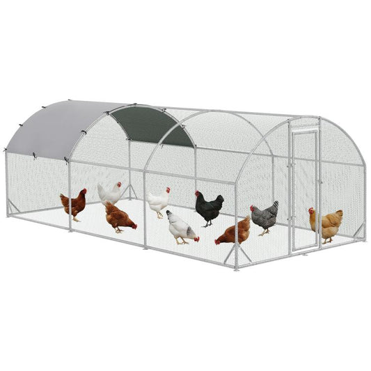 Large metal chicken coop with arched gray fabric cover and front access door
