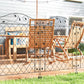 Black steel privacy-style fence panel with diamond lattice and ornate scroll detailing