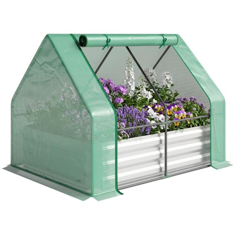 Galvanized raised garden bed with mini greenhouse cover and planted flowers inside