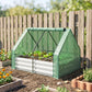 Mini greenhouse cover on galvanized raised garden bed with seedlings and soil base