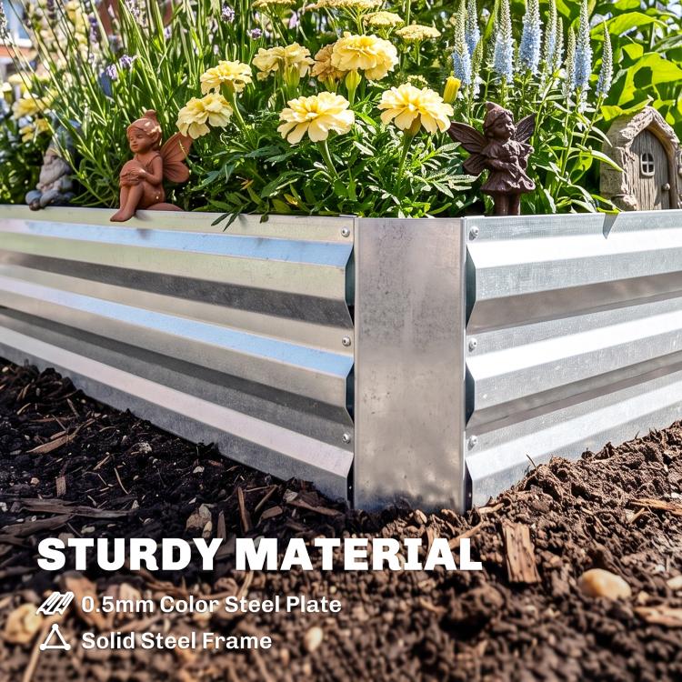 Galvanized raised garden bed with yellow flowers and tall plants along the side