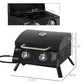 Black 2-burner tabletop gas grill with lid closed and front control knobs