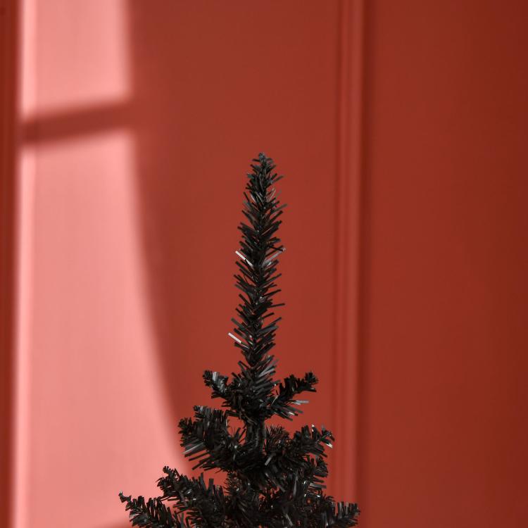Black pencil artificial Christmas tree top section with dense branch tips