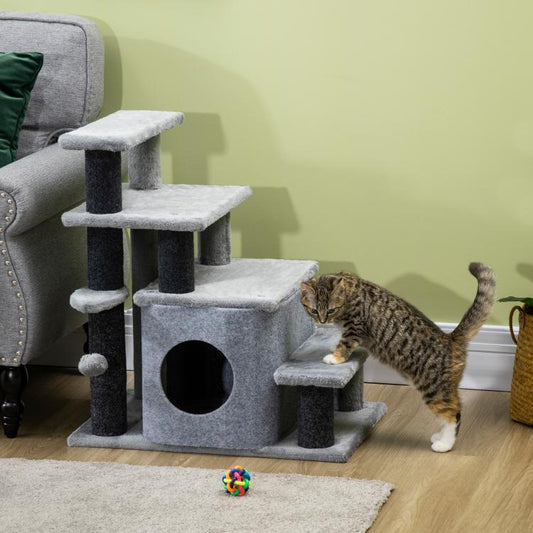 Gray cat stairs and condo with scratching posts and tunnel; cat climbing on platforms