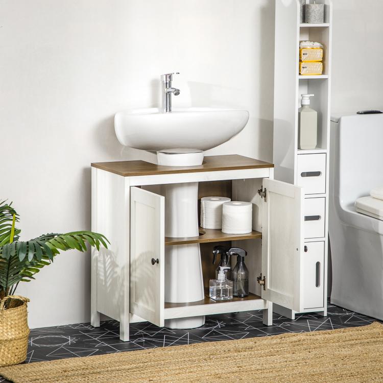 Bathroom sink cabinet with open doors showing storage shelves and countertop cutout