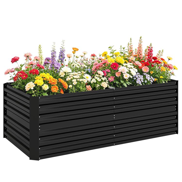 Black steel raised garden bed filled with colorful flowers