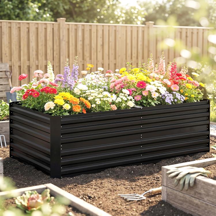 Black steel raised garden bed with bright flower border and slatted panels