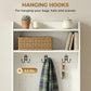 White coat rack with multiple hanging hooks, shelves, and open shoe storage