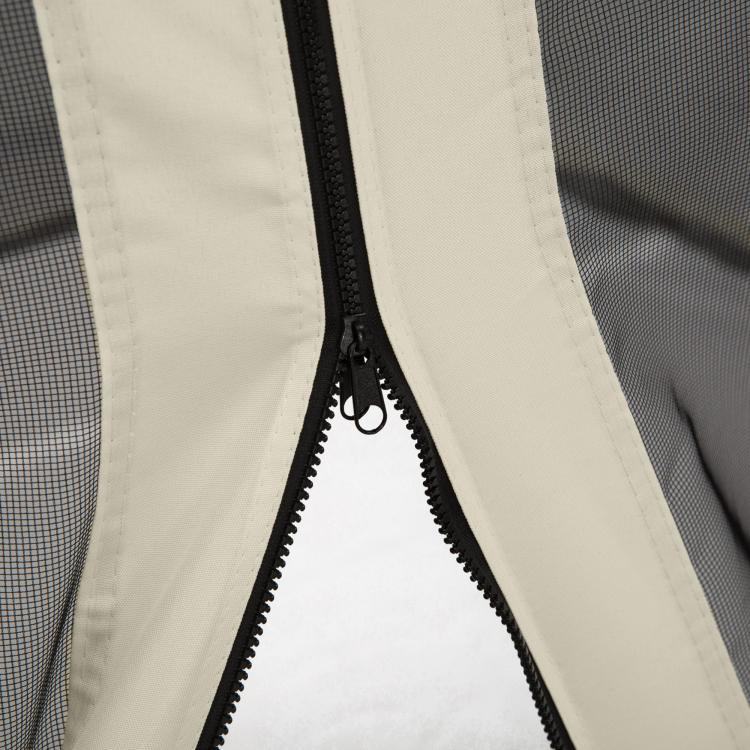 Close-up of cream mesh sidewall zipper with black zipper track