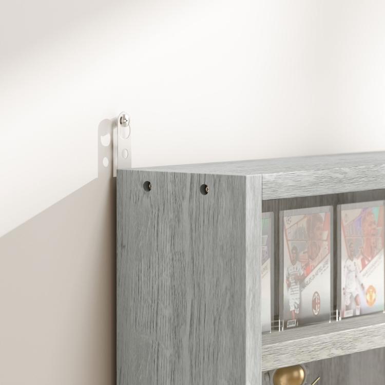 Wall-mounted gray display cabinet corner with glass door edge and metal hinges