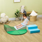 Toddler climbing on green and blue foam blocks with wedge steps
