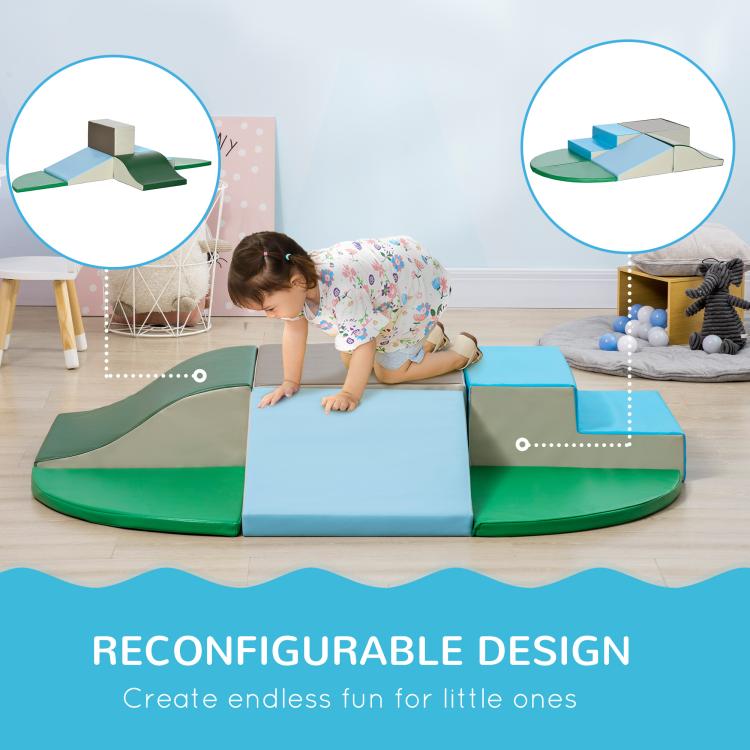 Foam climbing blocks with green curved base and blue platforms, toddler crawling