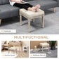 Beige linen-feel ottoman bench with button-tufted seat and carved wooden legs