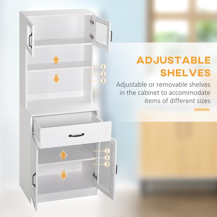 White cabinet interior with adjustable shelves, lower pull-out drawer, and open door panels.