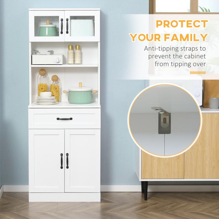 White pantry cabinet with lower double doors and hutch shelves; anti-tip strap detail.