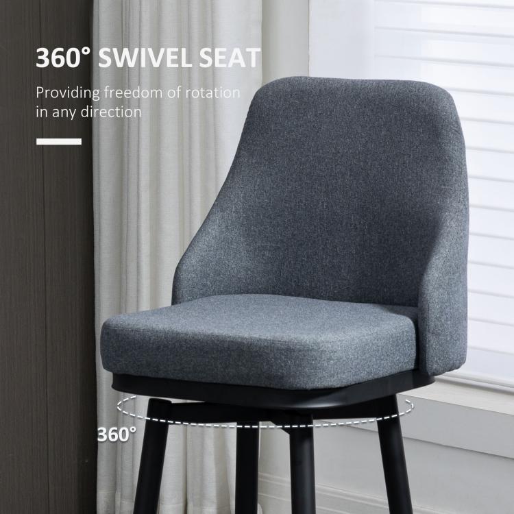 Dark gray upholstered swivel bar stool with curved back and padded seat cushion