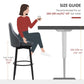 Dark gray upholstered bar stool with black legs and round footrest, size shown