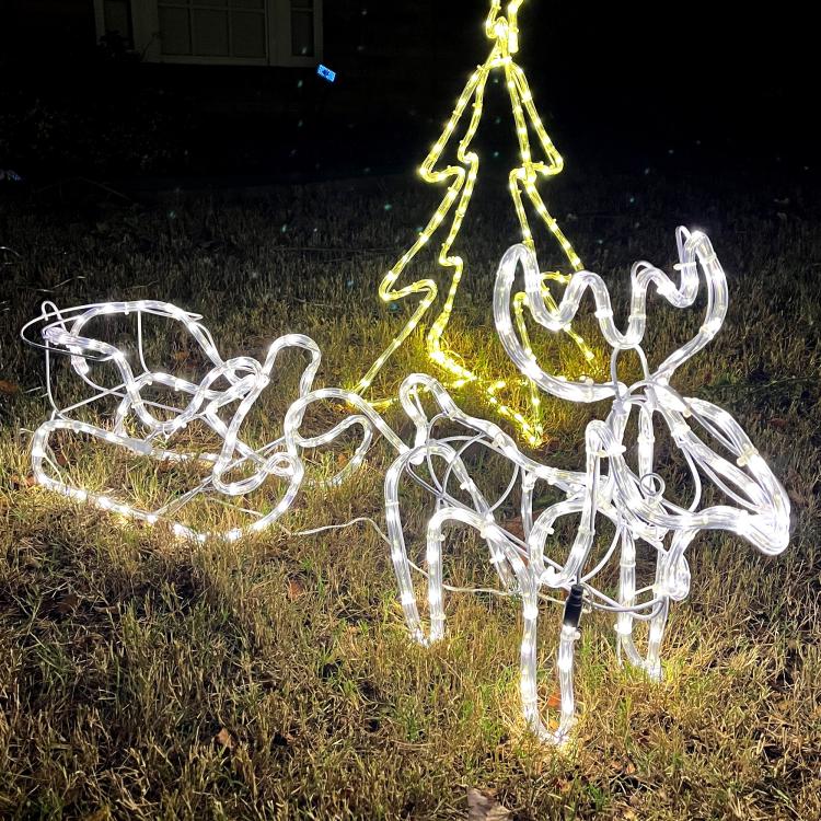 Warm and cool white LED reindeer and sleigh yard decoration with glowing wire frame