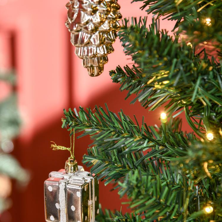 Artificial green pencil Christmas tree with warm white LED lights and gold ornament detail