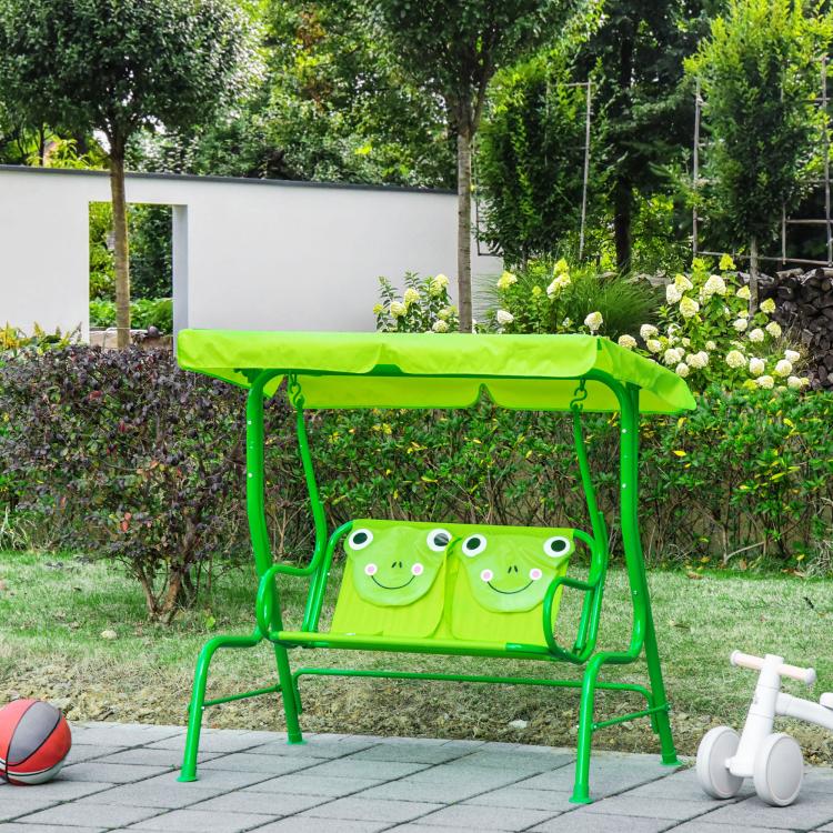Green kids patio swing with canopy and double seat cushions on patio