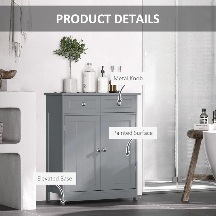 Gray bathroom floor cabinet with painted finish and metal knobs on doors and drawers