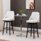 Cream upholstered bar stools set of 2 with arched backs and black circular footrests
