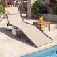 Beige padded reclining chaise lounge chair with headrest outdoors near pool