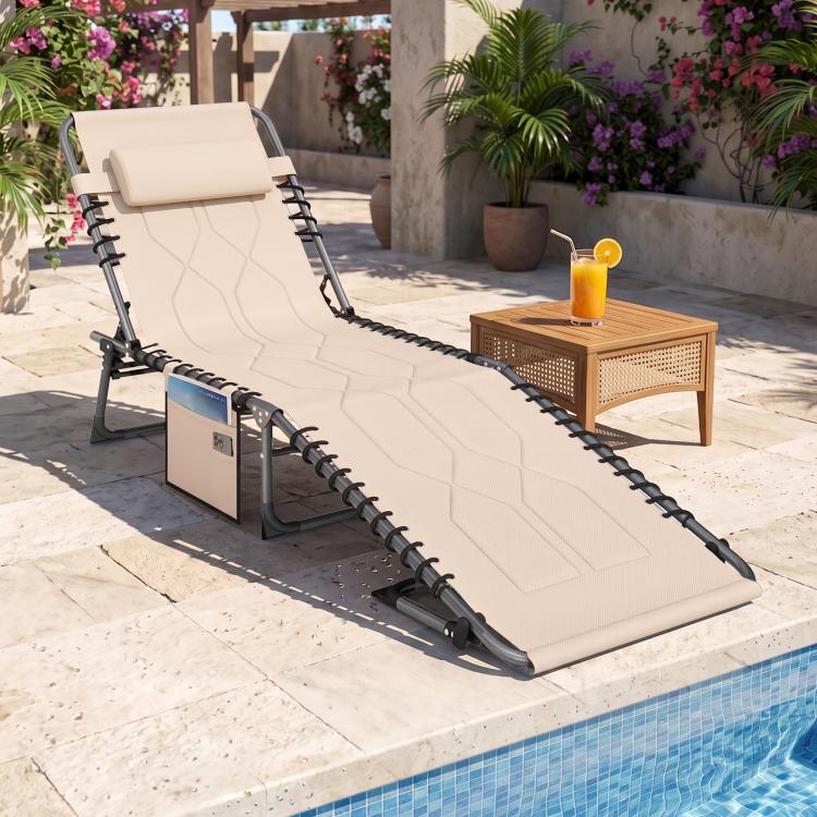 Beige padded reclining chaise lounge chair with headrest outdoors near pool