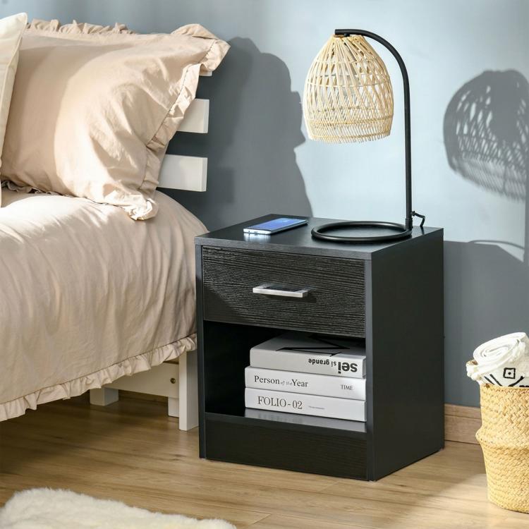 Black wood-grain side table with silver drawer handle and open storage shelf.