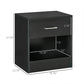 Black wood-grain side table featuring a single drawer and open lower shelf.