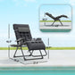 Black padded folding zero-gravity recliner chair with adjustable recline and footrest