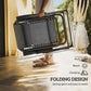 Black folding zero-gravity chair with gray headrest cushion, compact folded frame