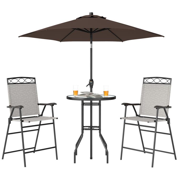 Outdoor patio bar set with brown umbrella, round table, and two folding chairs
