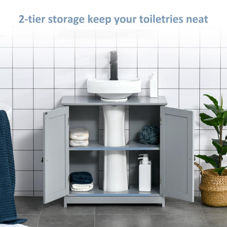 Gray bathroom sink storage cabinet with open double doors and two-tier interior