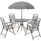 Outdoor patio dining set with gray umbrella canopy and four folding chairs, round table