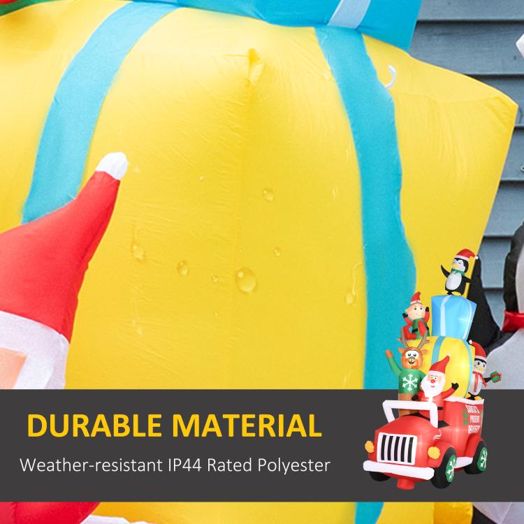 Close-up of inflatable Santa gift car roof in blue and yellow with characters