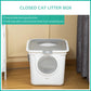 Closed white covered cat litter box with round front entrance and lidded top grate