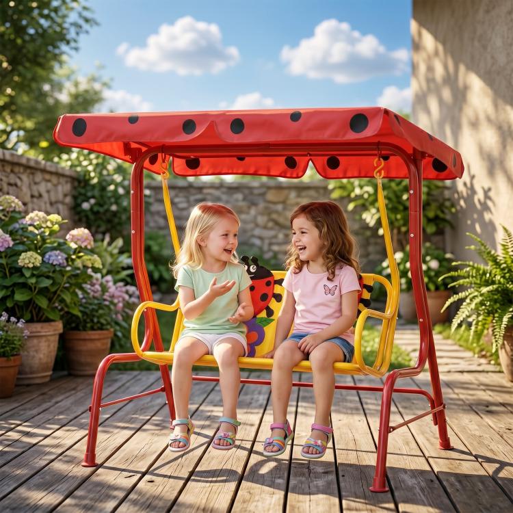 Red two-seat kids swing with ladybug seats, yellow safety handles, under covered canopy
